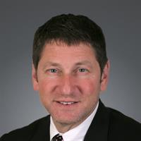 portrait of Sam Woolbert, MD