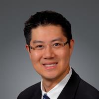 portrait of Lowell T Ku, MD