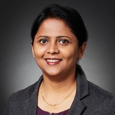 Asha Tharakan, NP