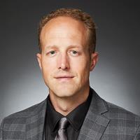 portrait of Justin Dowdy, MD, FAANS