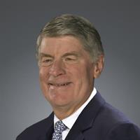 portrait of Delbert Alan Johns, MD